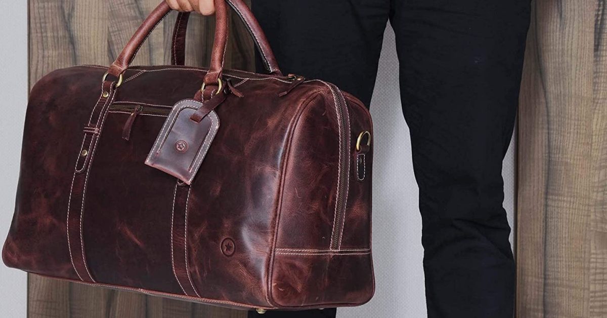 Luxurious Second-Hand Orange Leather Travel Bag Available Online