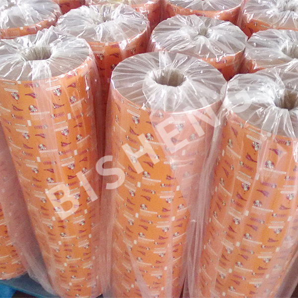 Plastic laminated packaging film roll