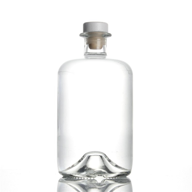 China supplier empty 500ml 700ml transparent round liquor brandy glass bottle vodka rum whisky spirits beverage bottle custom logo