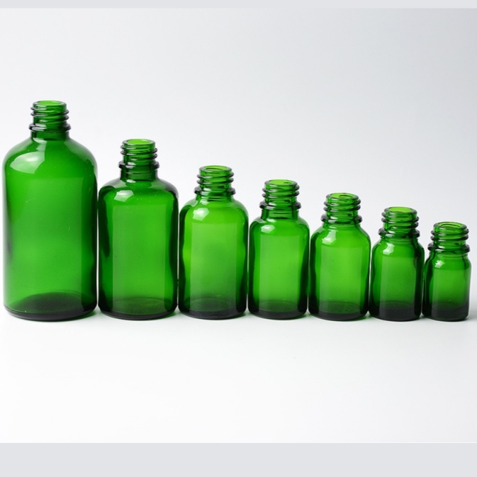 China wholesale 30ml 50ml 100ml 120ml Boston empty green essential oil glass bottle cosmetic custom logo and capacity