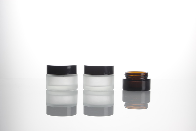 China factory hot-sale mini 1oz 2oz 4oz 30ml 50ml 100ml empty cream glass jar frosted cosmetic  glass jar custom 