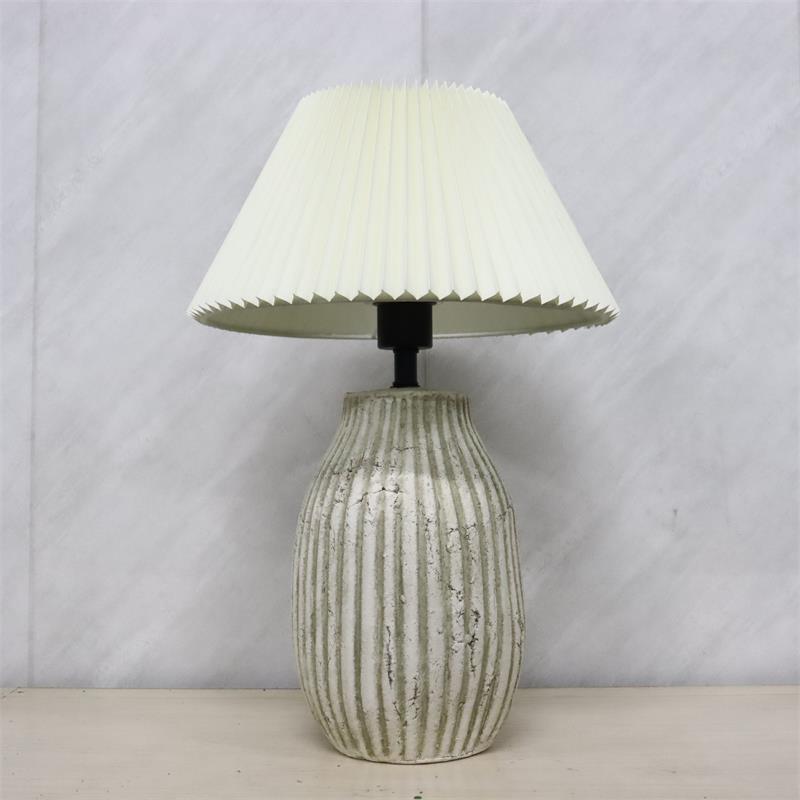 Pleated vertical strip ceramic table lamp