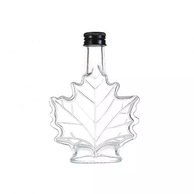 Unique 50ml 100ml 250ml Maple Leaf Shaped Glass Bottle Glass Beverage Bottle with Screw Cap