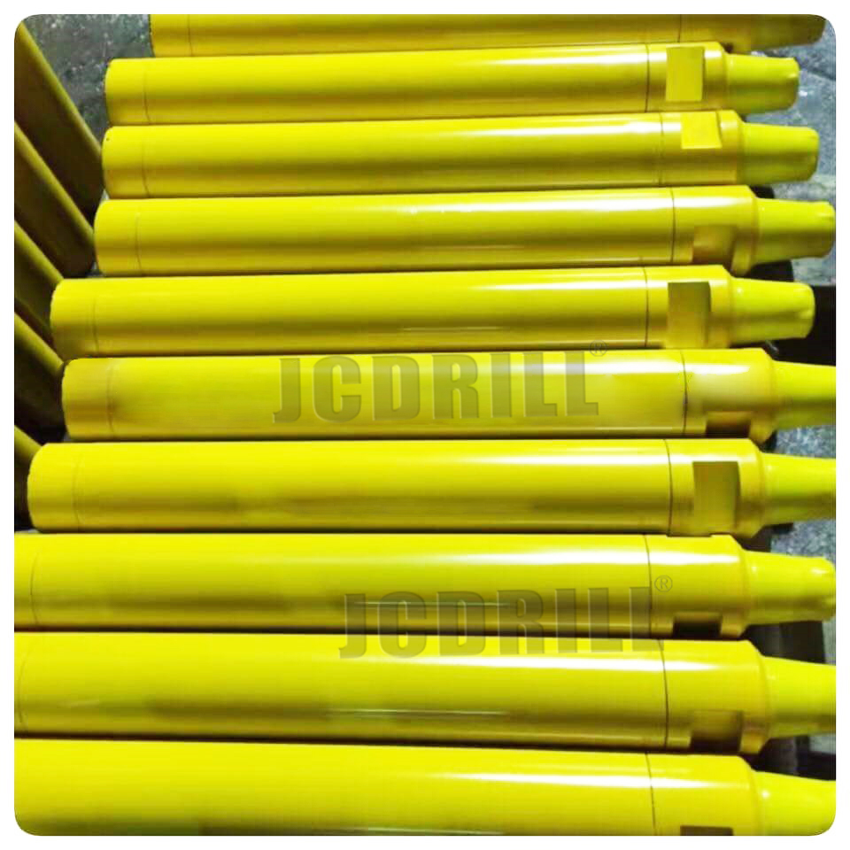 Features:特点 1.Suitable for all rock conditions at a wide range of air pressures 116-435psi (8-30bar) 2.Patent structure reduces consumable parts to avoid interactive wear, increase hammers reliability and increase 10%-30% faster penetration rates and make hammer more easy for maintenance 3.Heat treated top sub, cylinder, piston, piston case, driver sub give hammers longer service life 4.Interchangeable with DTH bit and drill pipe 5.Extremely efficient air exhaust provide excellent hole cleaning and allows for drilling against very large volumes of water