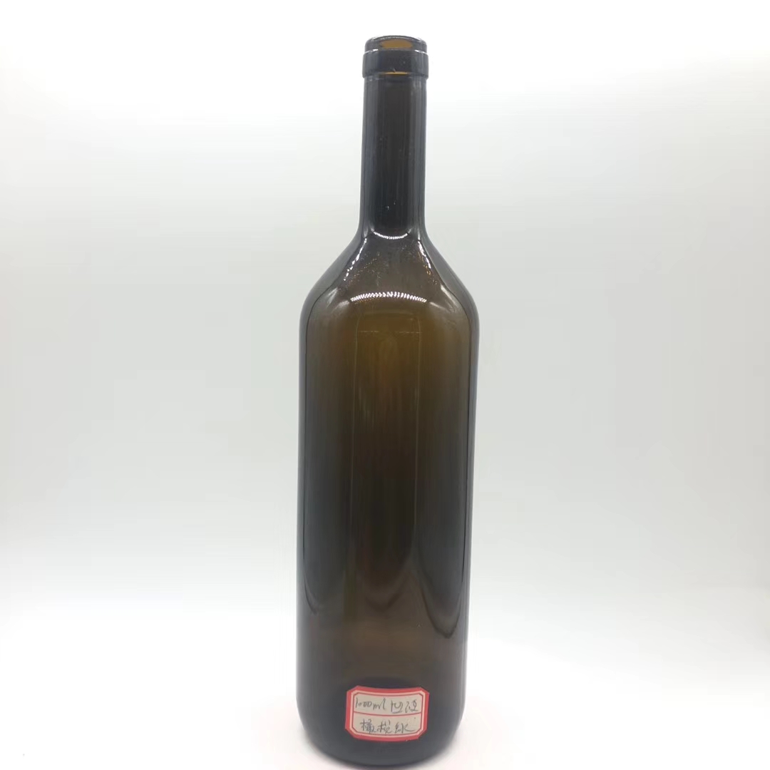 Dark green transparent red wine glass bottle