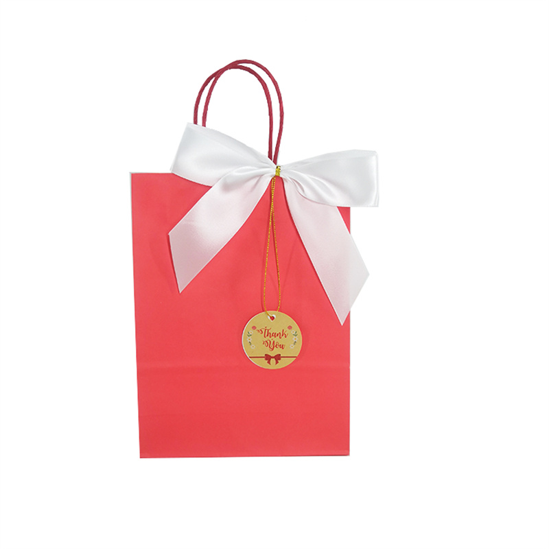 White Kraft Paper Bag Decorated With Label Bows