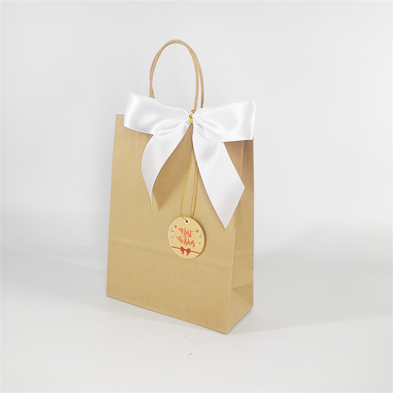 White Kraft Paper Bag Decorated With Label Bows
