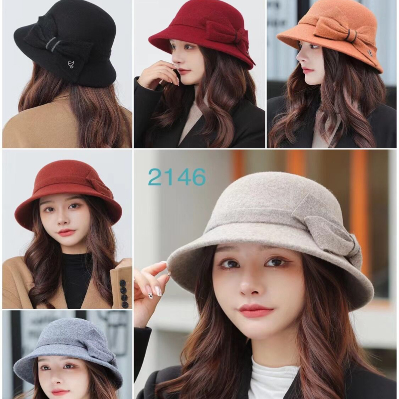 Korean version of the new pure color woolen woolen hat for autumn and winter ladies all-match Japanese casual dome light fisherm